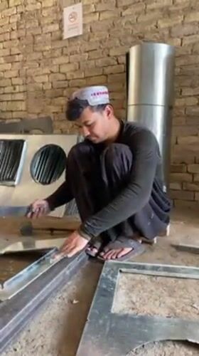 Metal workers fabricate components in Kandahar workshops