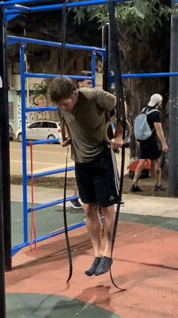 Man attempts ring dips exercise in Buenos Aires