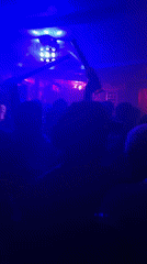 Late night club scene with dancing and live percussion in Guzape
