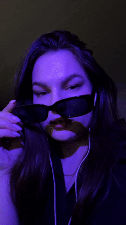 Woman takes selfies, applies makeup in Chaikovsky apartment