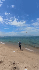 Watersports and beach activity at Nha Trang on a summer morning