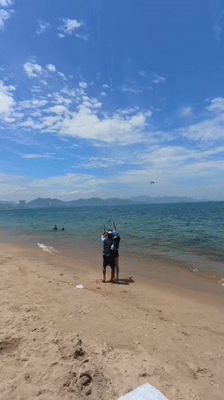 Watersports and beach activity at Nha Trang on a summer morning