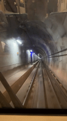 Train journey through illuminated tunnel in Coquitlam