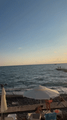 Sunset hours on Sochi's Black Sea beach and waterfront cafés