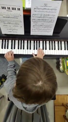 Children practice piano in Podgorica music sessions