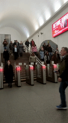 Street performer dances at Saint Petersburg subway station