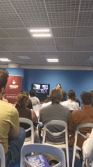 Film lecture underway in Cannes with presenter and attendees