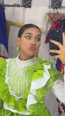 Mirror selfies in folkloric costume, Porlamar dressing room