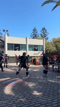 Young dancers perform synchronized routine outdoors in Arica Chile
