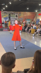 Indoor fashion show on a blue runway, Astrakhan mall