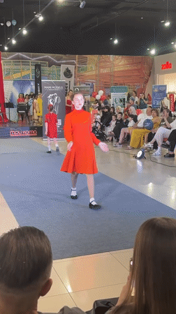 Indoor fashion show on a blue runway, Astrakhan mall