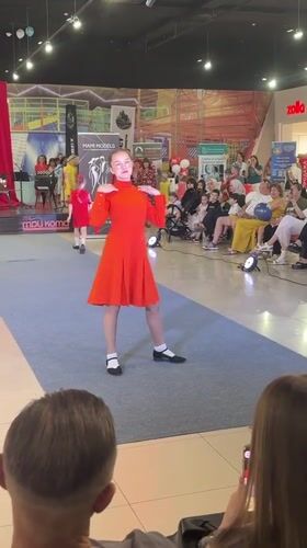 Indoor fashion show on a blue runway, Astrakhan mall
