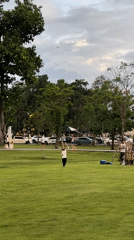 Dog owners and their pups hang out at a Chang Phueak park
