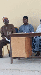 Community meeting held in Akwanga, Nigeria with speakers
