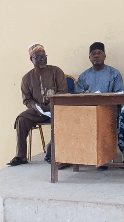 Community meeting held in Akwanga, Nigeria with speakers