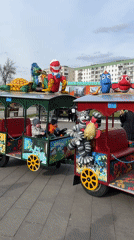 Children's train and skateboarding activities captured in Ufa park