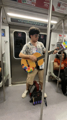 Street musician performs on Buenos Aires subway Friday evening