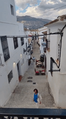 Witness captures Mediterranean street scenes in historic Altea, Spain