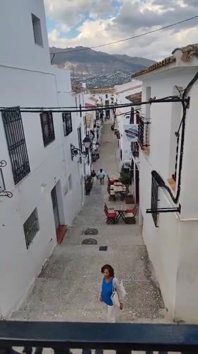 Witness captures Mediterranean street scenes in historic Altea, Spain