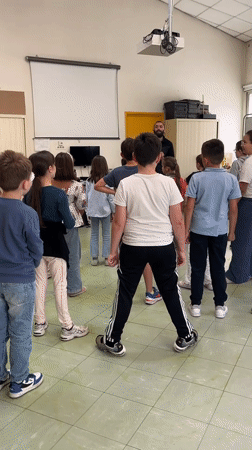 Children attend singing and drawing lessons in La Fouillouse school