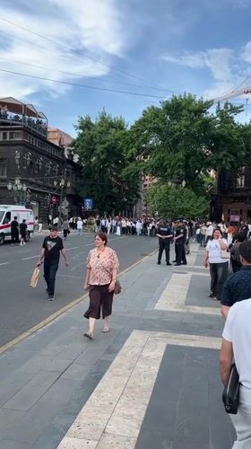 Crowd marches through central Yerevan in white shirts