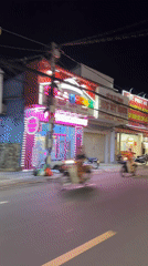 Nighttime street scene captured in Đồng Nai, Vietnam