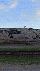 Decaying warehouse filmed in abandoned train yard