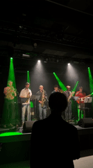 Six Musicians Perform Under Spotlights in Copenhagen Evening Show