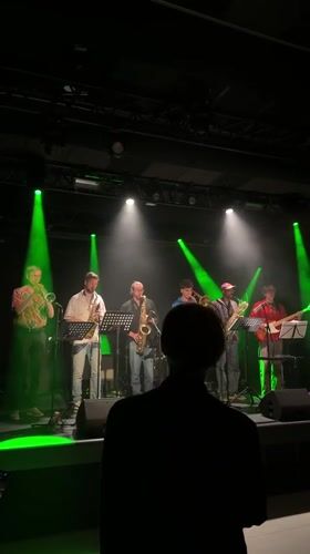 Six Musicians Perform Under Spotlights in Copenhagen Evening Show