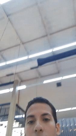 Young man films himself in Porlamar shopping mall