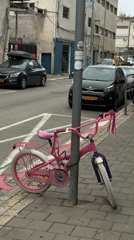 Morning scenes in Tel Aviv: chained bicycle, indoor portrait