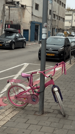 Morning scenes in Tel Aviv: chained bicycle, indoor portrait