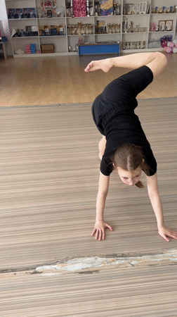 Girls practice dance floor exercises in Votkinsk studio