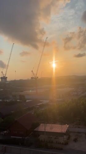 Sunrise landscape with construction cranes filmed in Pattaya
