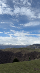 Two hikers spotted in Russian mountain landscape