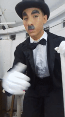 Chaplin and Monroe impersonators pose backstage in Porlamar