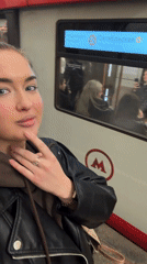 Woman documents evening Metro commute at Moscow's Oktyabrskaya station