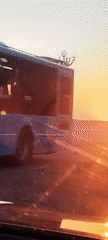 Bus 7 cuts through Sochi streets at golden hour