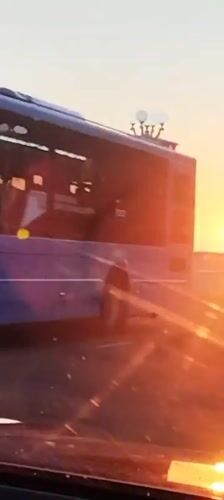 Bus 7 cuts through Sochi streets at golden hour