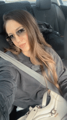 Woman passenger photographed in car in Shishmantsi, Bulgaria