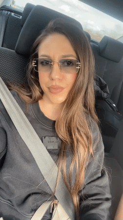 Woman passenger photographed in car in Shishmantsi, Bulgaria