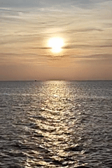 Sunset fishing scene documented along Lhokseumawe coastline