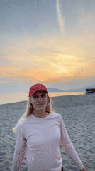 Woman in athletic wear observed on Alanya beach at sunset