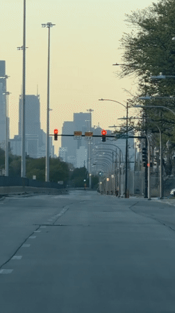 Chicago street scene shows hazy skyline conditions early morning