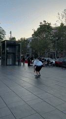 Afternoon life continues in sunny Barcelona plaza