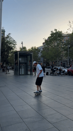 Afternoon life continues in sunny Barcelona plaza