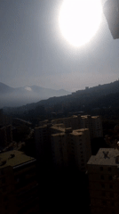 Sunny day captured over Caracas skyline with mountain backdrop