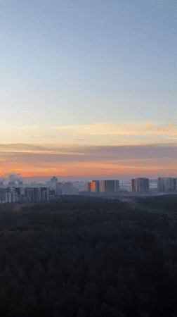 Moscow sunrise transforms skyline in orange and pink hues