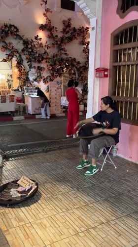 Everyday street life and culture documented across Phuket City