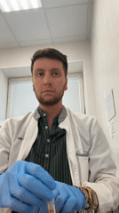 Laboratory worker examines test tubes in Moscow facility